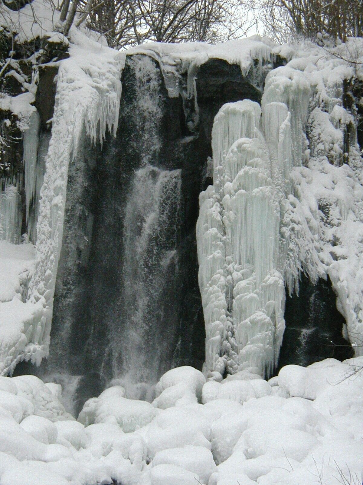 A waterfall with ice formations.