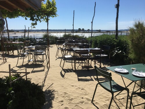 A charming villa with Cap Ferret lighthouse.