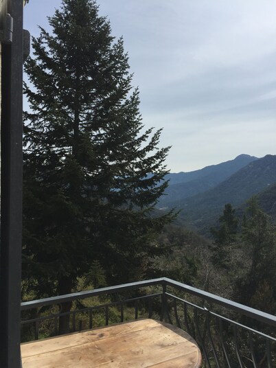 House between sea and mountains
