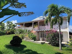 Exterior - Studio South East, large terrace facing the sea in tropical garden. (capesterre belle eau)