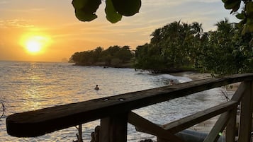 On the beach, sun loungers