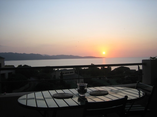 VIEW OF THE GULF OF ST. FLORENT AND AN UNFORGETTABLE SUNSET