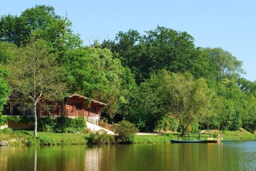 Wooden cottage on the water