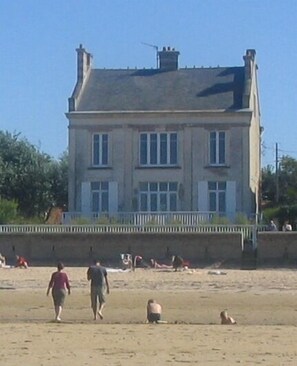 On the beach, sun loungers