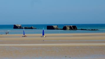 On the beach, sun loungers