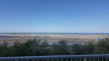 On the beach, sun loungers