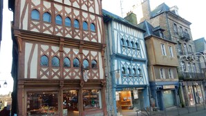 A row of traditional European buildings with timber framing and large windows. - House with private indoor pool and 29° sauna. Summer 2027: Private Indoor and Outdoor Pools (Boqueho)