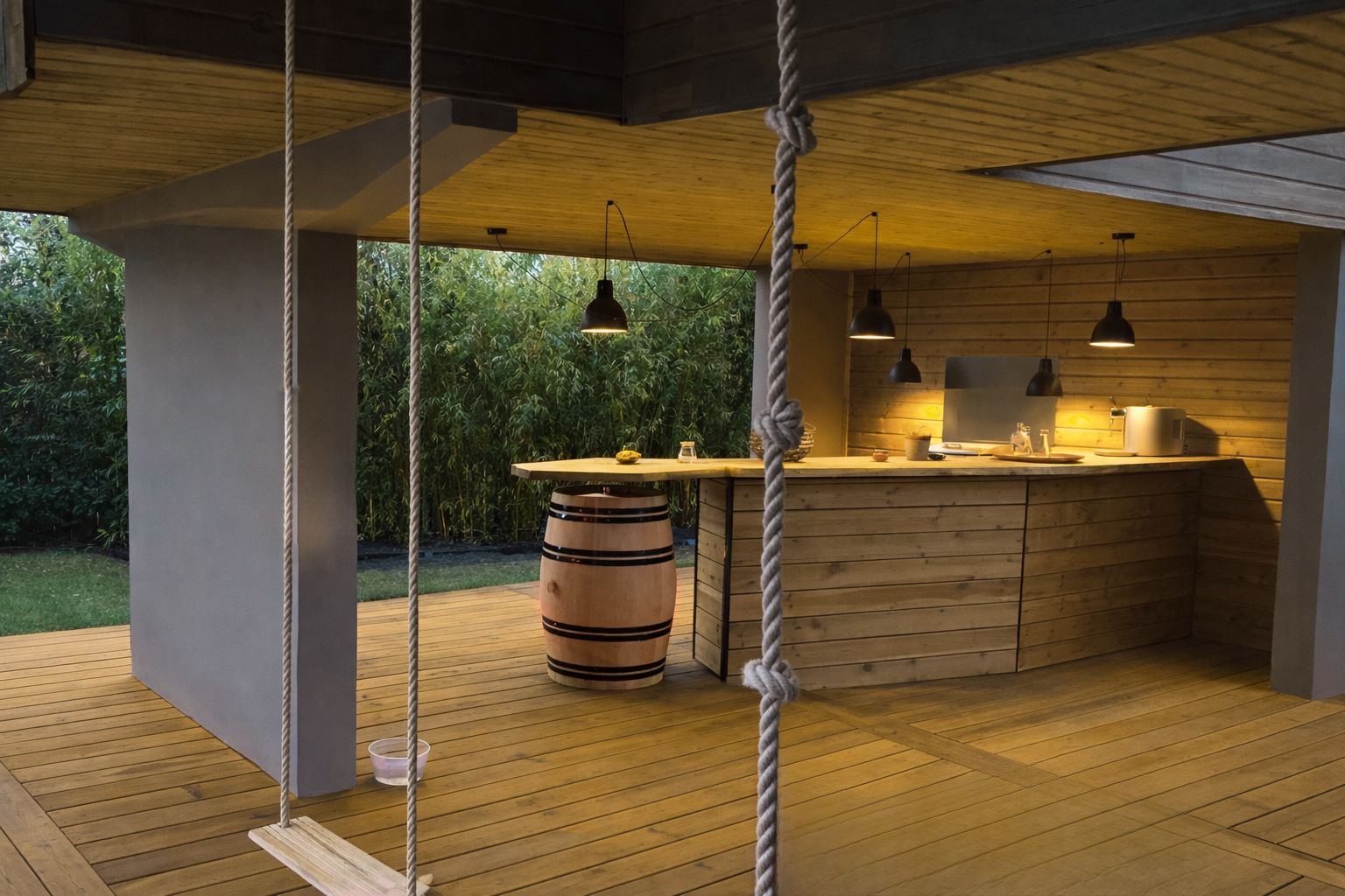 Una cocina moderna con armarios de madera, una isla central e iluminación colgante.