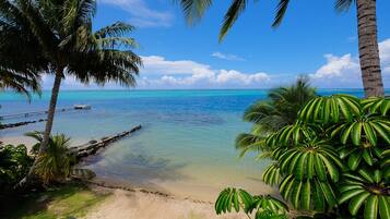 On the beach, sun-loungers, beach towels
