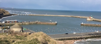 OMAHA BEACH COTTAGE BETWEEN EARTH AND SEA