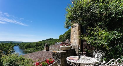 In the heart of the village, the TIBALOU. Breathtaking views of the river.