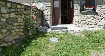 Stone house with terrace in typical mountain village on GR 54