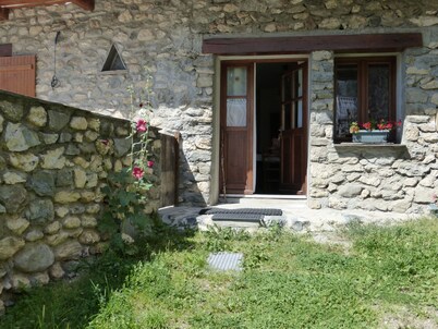 Stone house with terrace in typical mountain village on GR 54