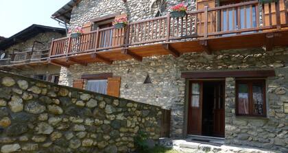 Stone house with terrace in typical mountain village on GR 54