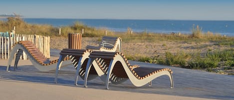 Beach nearby, sun loungers