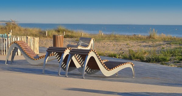 Beach nearby, sun loungers