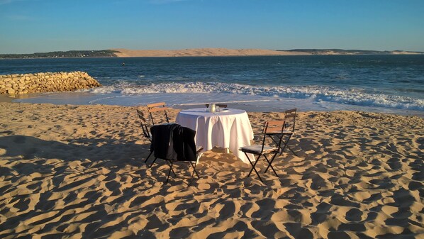 On the beach, sun loungers
