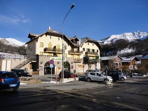 Third-party on-site parking, car recommended