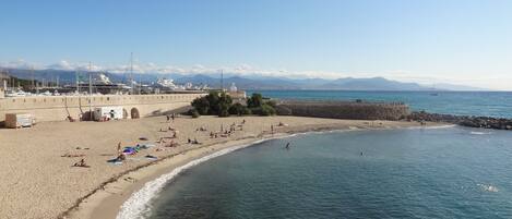 On the beach, sun loungers, beach towels
