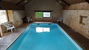 Alberca techada y alberca climatizada