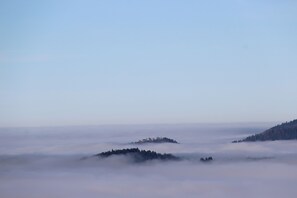 A landscape with two hills partially obscured by fog. - CHARMING CHALET HAUTES VOSGES (Saulxures-sur-Moselotte)