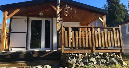Charming individual chalet, very comfortable, located at the bottom of the ski slopes
