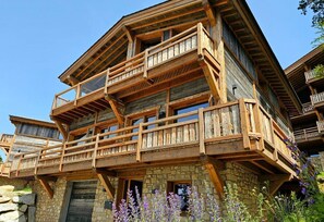 A multi-story wooden building with balconies and large windows. - Chalet Angora Collection Cassiopée (Font-Romeu-Odeillo-Via)