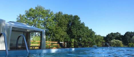 Piscine extérieure, piscine chauffée