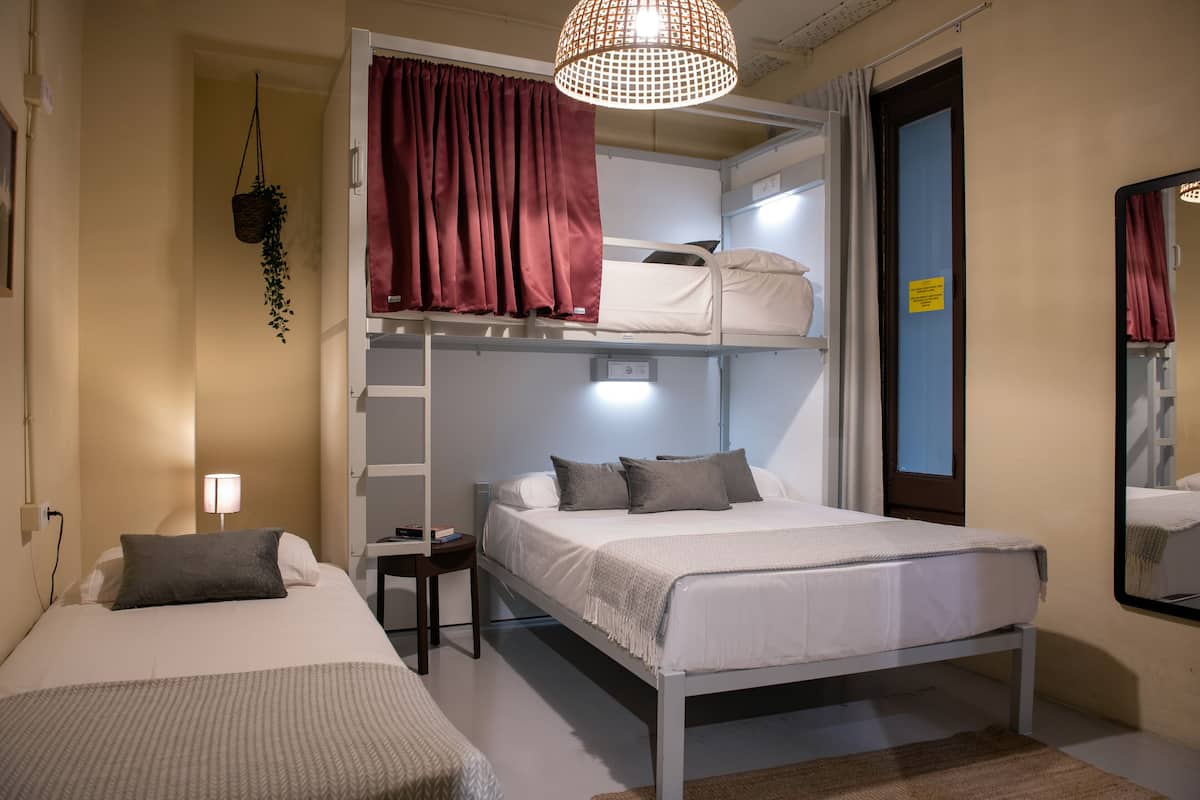 Quadruple Room, Private Bathroom | 1 bedroom, blackout drapes, soundproofing, free WiFi