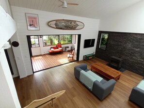 TV, fireplace, books