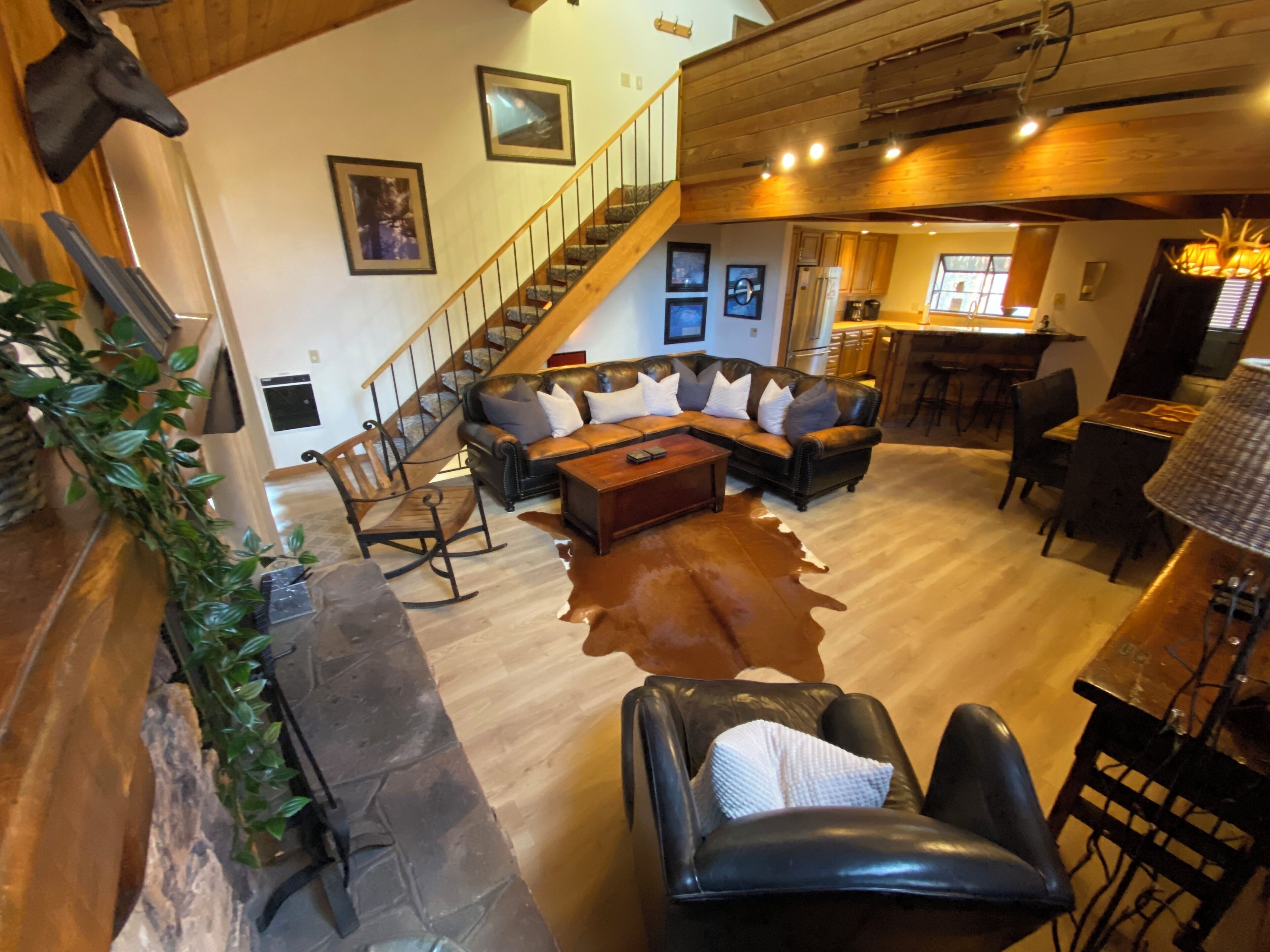 Living room, kitchen, dining area, bathroom (2nd floor).