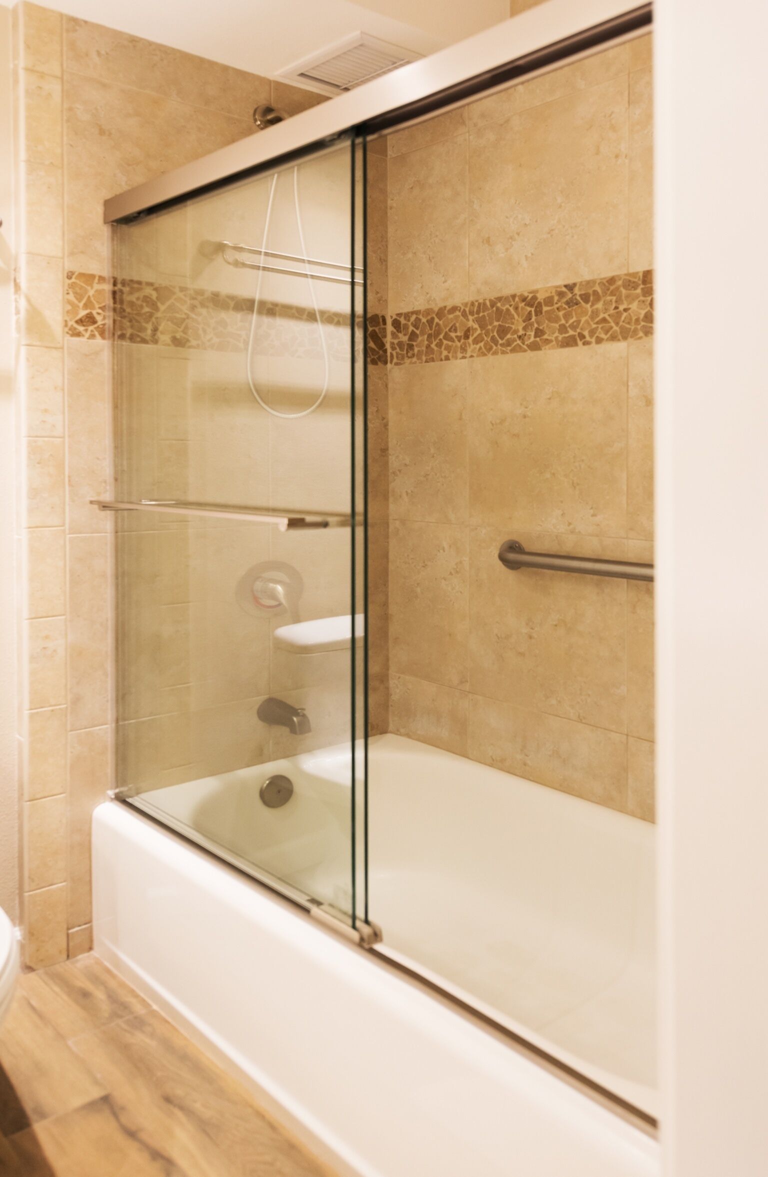 Bathtub, hair dryer, towels, soap