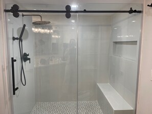 Bathtub, hair dryer, towels