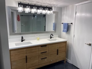 Bathtub, hair dryer, towels