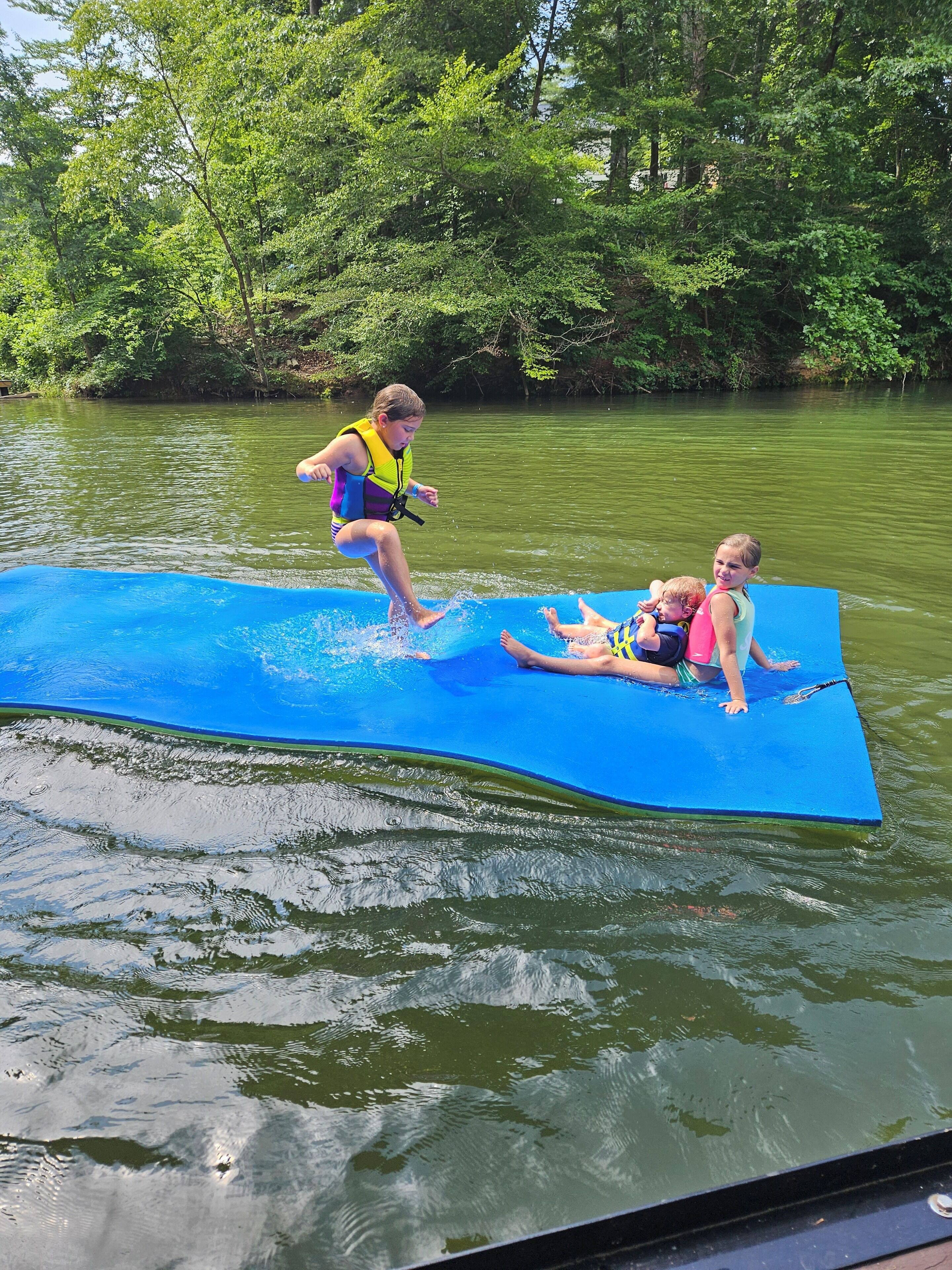 The "Lily Pad" water mat is the best.  Kids love it more than the swing!
