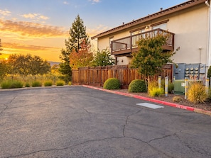 A residential building with a balcony, a fenced driveway, and a fire lane. - Sonoma 2BR Condo | 2 Private Patios, Kitchen & A/C (Sonoma)