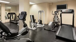 A gym with treadmills, elliptical machines, and weight equipment. - Right on the Waterfront Marina - Suite 117 - 7150 N Tamiami Tail, Sarasota FL (Sarasota)