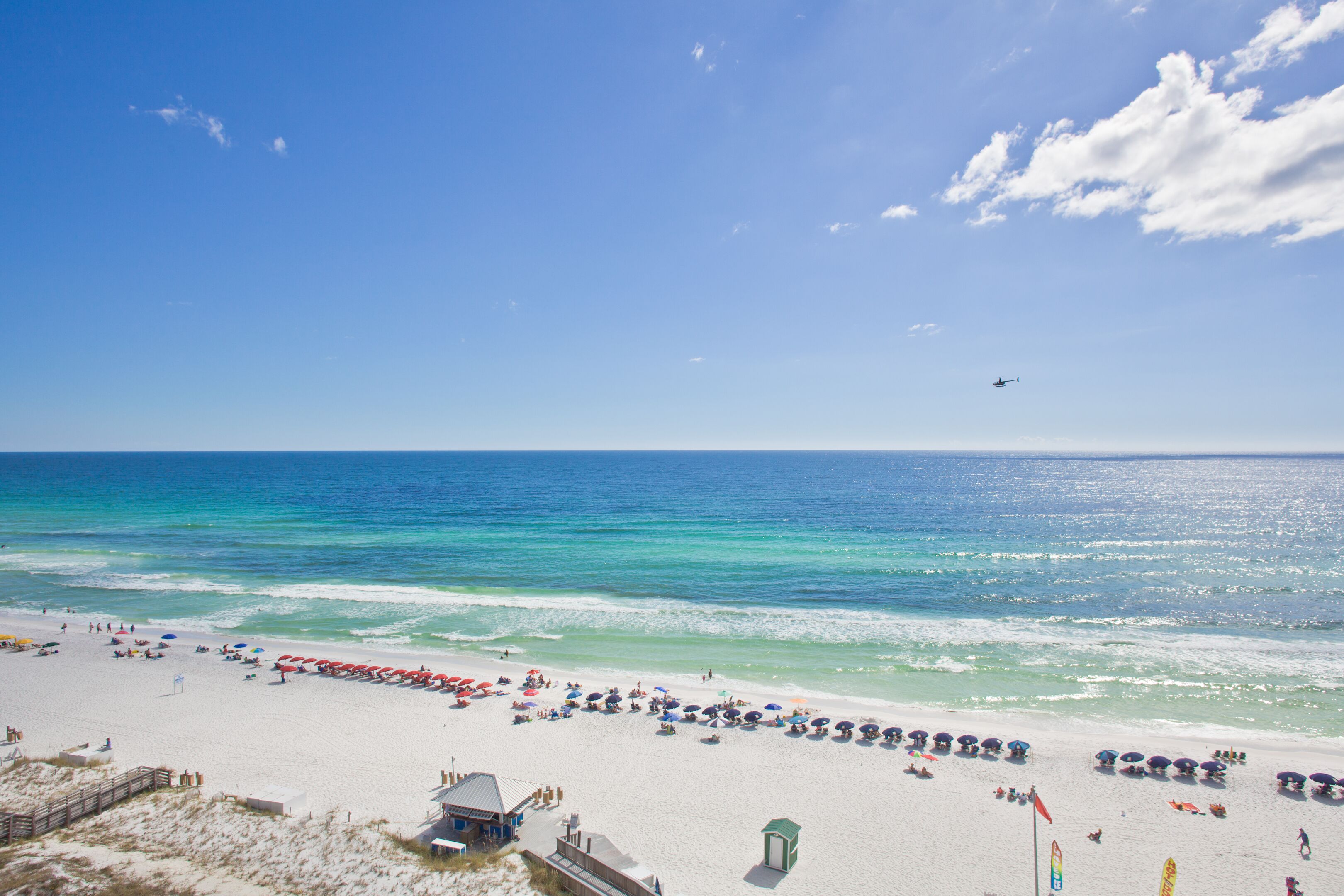 On the beach, sun-loungers
