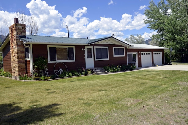 Front of house also showing sliding glass door which goes into a indoor porch.