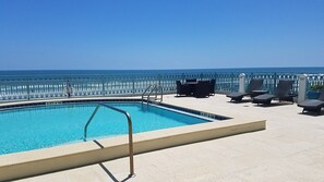 Outdoor pool - Stylish beach front condo with spectacular view! (New Smyrna Beach)