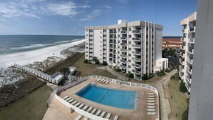 A high-rise hotel with a pool and beach view. - Multi-Family, sleeps 12, GULF FRONT with BEACH VIEWS FROM EVERY ROOM (Pensacola Beach)