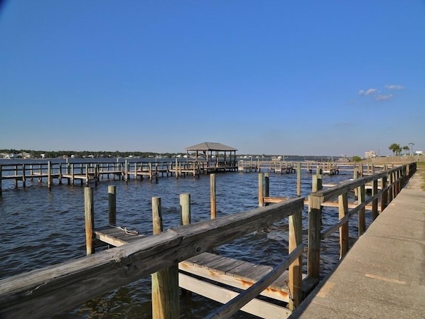 Stroll along the waterfront pier, taking in the serene views of the water and surrounding shoreline.