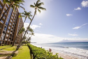 On the beach, sun loungers, beach towels