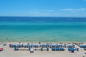 On the beach, sun loungers