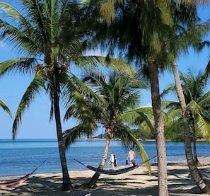 On the beach, sun-loungers, beach towels