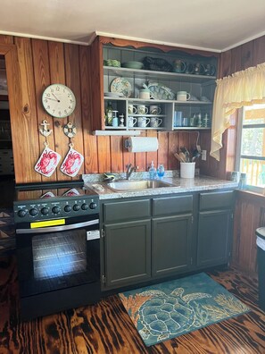 Fridge, microwave, oven, stovetop - The Bonaire Cottage~ Private Dock!!! ~ Rustic Fun Waterfront Cottage!!!  (Cedar Key)