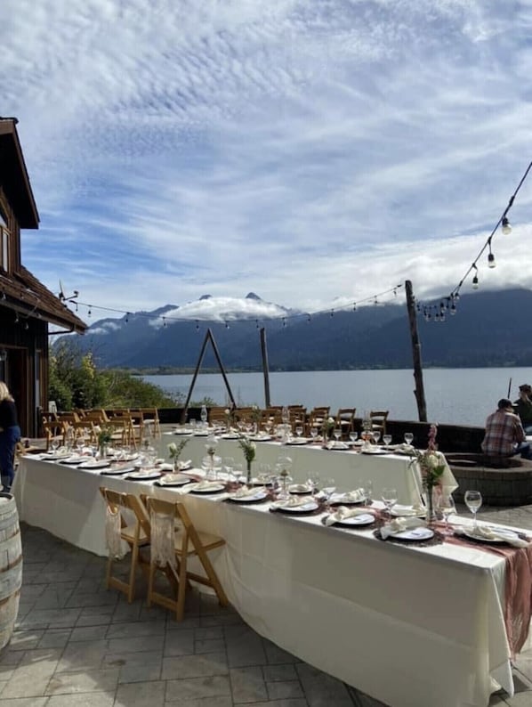 Outdoor banquet area - Unique Two House Estate. (Amanda Park)