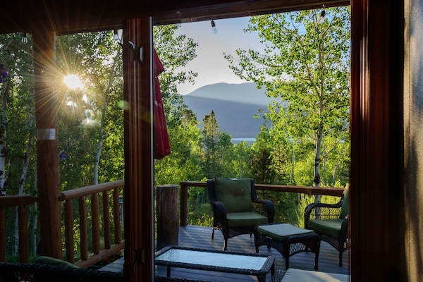 Deck at Sunrise, lake in the background.