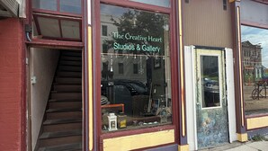 A storefront with a sign reading "The Creative Heart Studios & Gallery". - The Nest: Beautiful Apartment Style Lodging In The Heart Of Downtown Decorah. (Decorah)