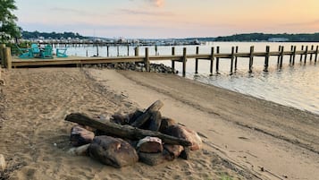 On the beach, sun-loungers